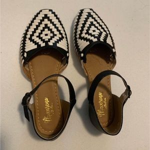 Adorable handmade leather shoes.